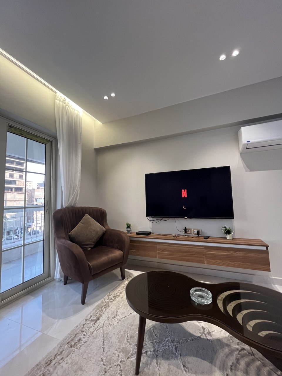 2-bedroom hotel apartment in Mohandessin, ideally located on Al Riyadh Street.